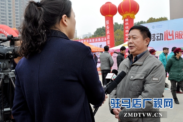 市消協秘書長王均接受駐馬店電視臺記者采訪.JPG
